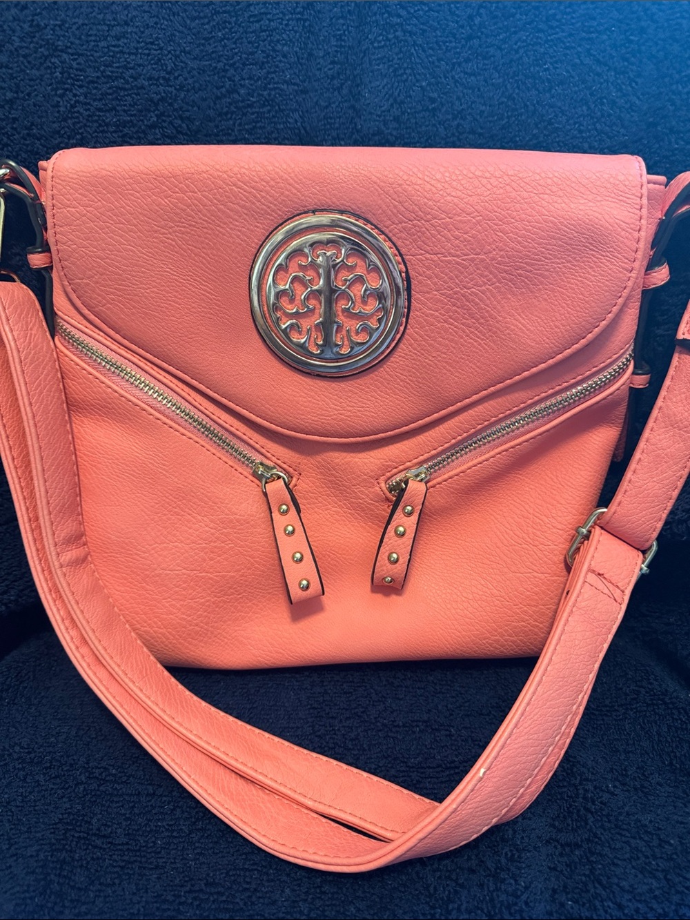 Coral Pink Crossbody Bag with Decorative Medallion